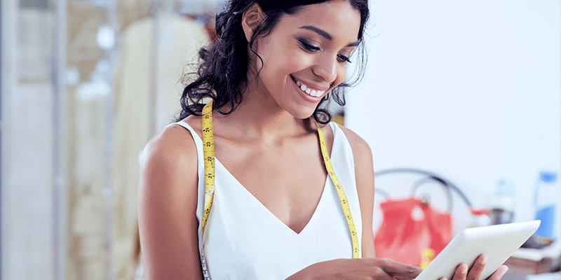 Business woman submitting her small business funding application.