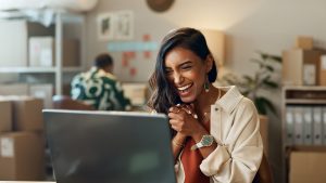 Business owner excited to start maximising their digital banking with a digital bank account.