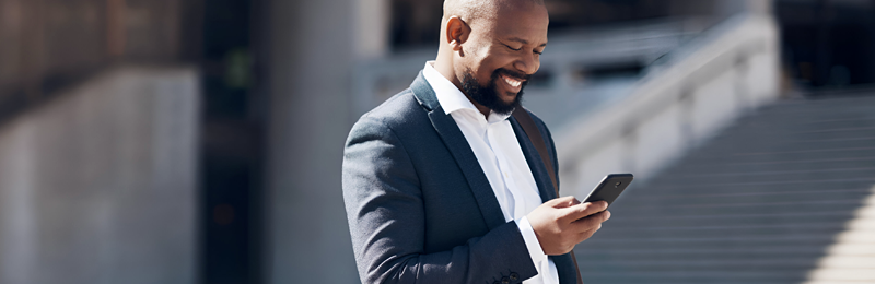 Business owner enjoying the benefits of his digital banking features. 