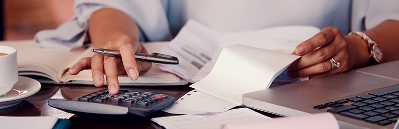 Business owner reviewing her business budget. 